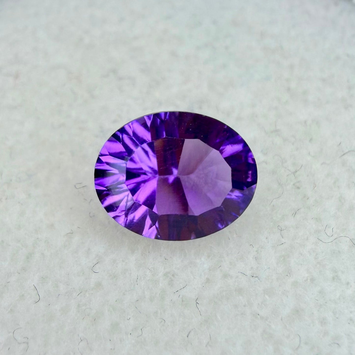 African Amethyst, 9x7mm Oval Concave Cut, Ave Ct Wt 1.60