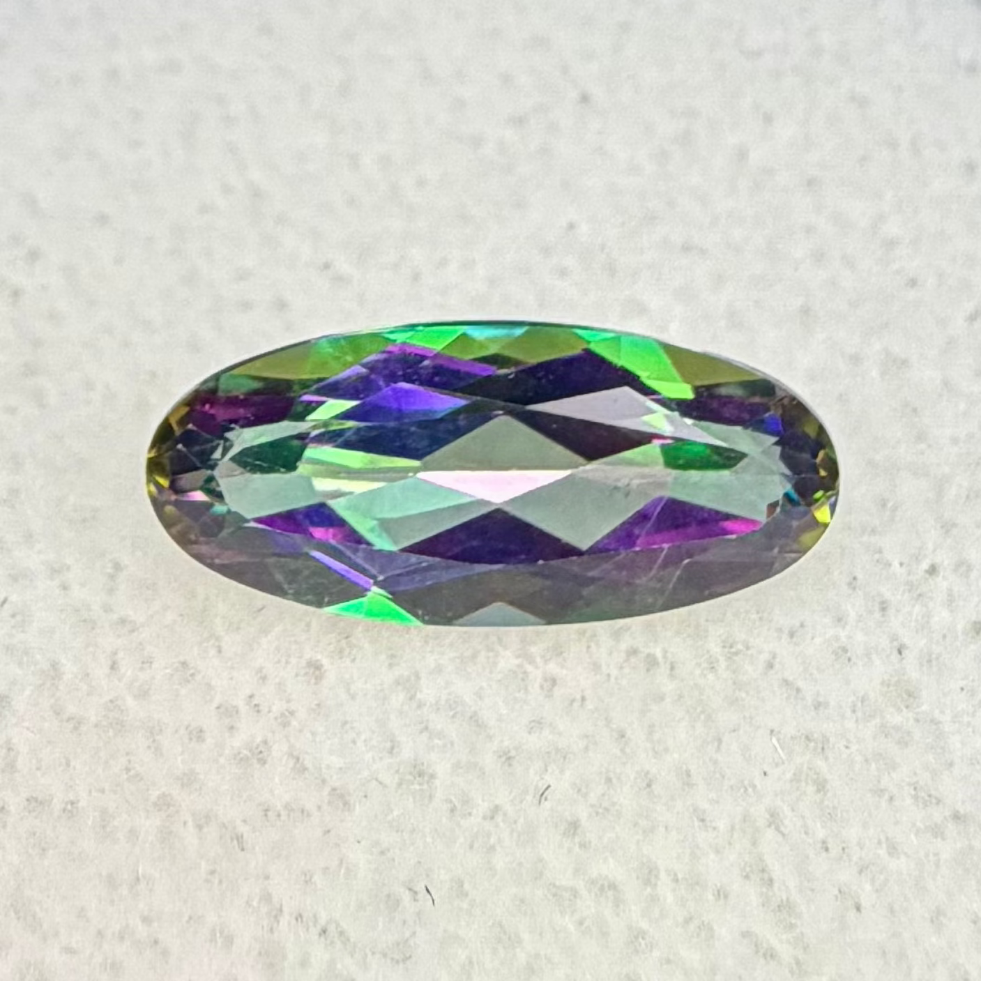 Mystic Rainbow Topaz, 14x6mm Oval Cut, Ave Ct Wt 2.95