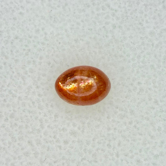 Sunstone Cabochon, 7x5mm Oval Cut, Ave Ct Wt .85