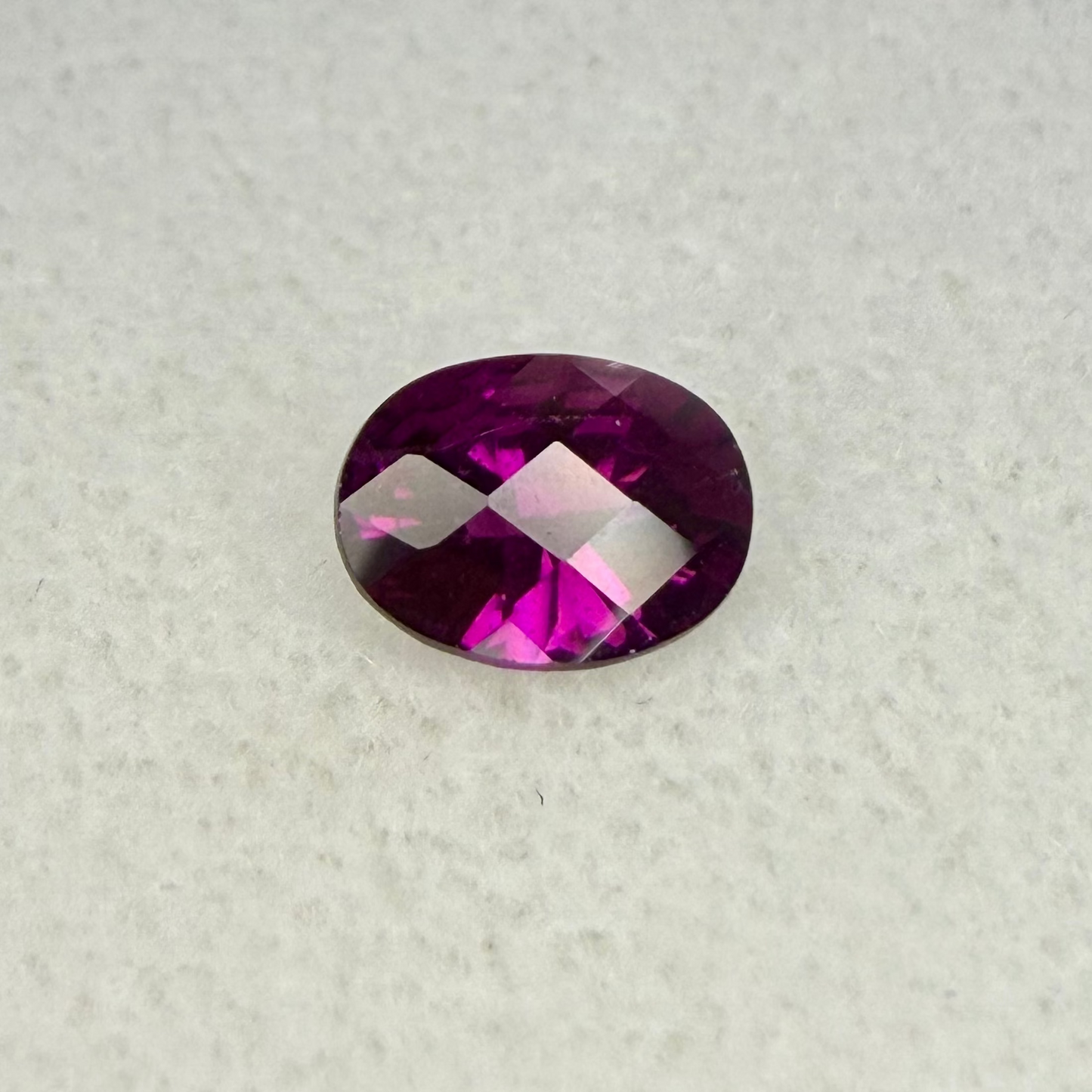 Rhodolite Garnet, 8x6mm Oval Cut Checkerboard Top, 1.23 Carats