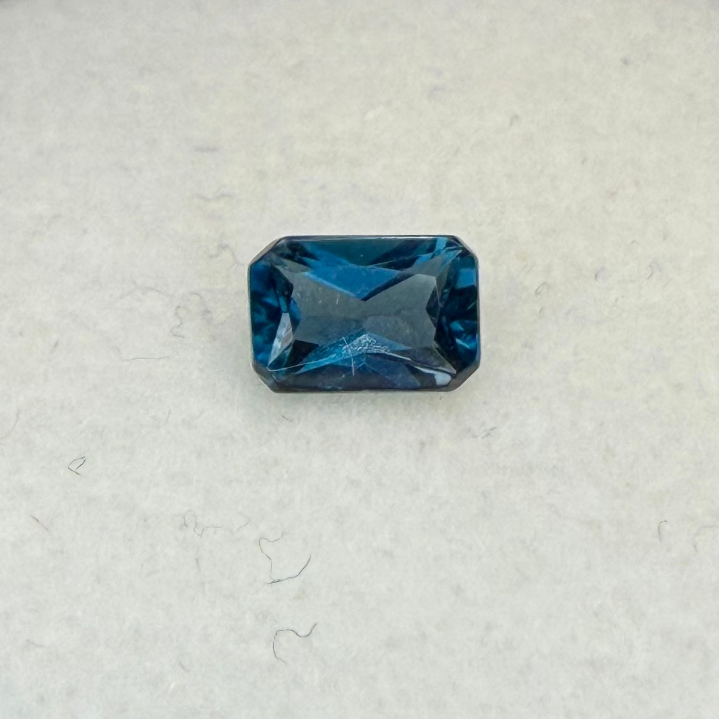 London Blue Topaz, 6x4mm Octagon Cut, Ave Ct Wt .69