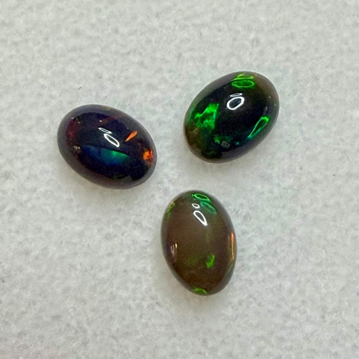 Ethiopian Black Opal Cabochon, 7x5 Oval Cut, Ave Carat Wt .55